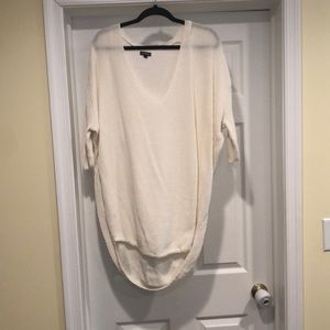 Express woman’s white sweater
